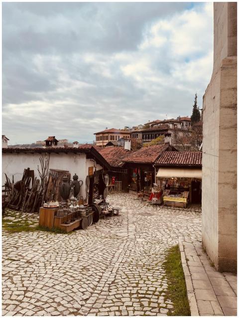 Cobblestone street with antique shops in a histori