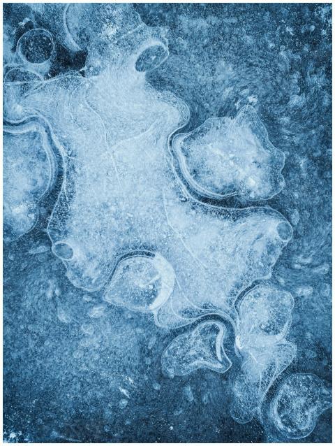 Detailed abstract image of frozen ice patterns wit