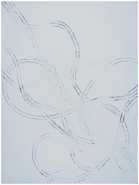 Artistic abstract pattern created by car tracks in