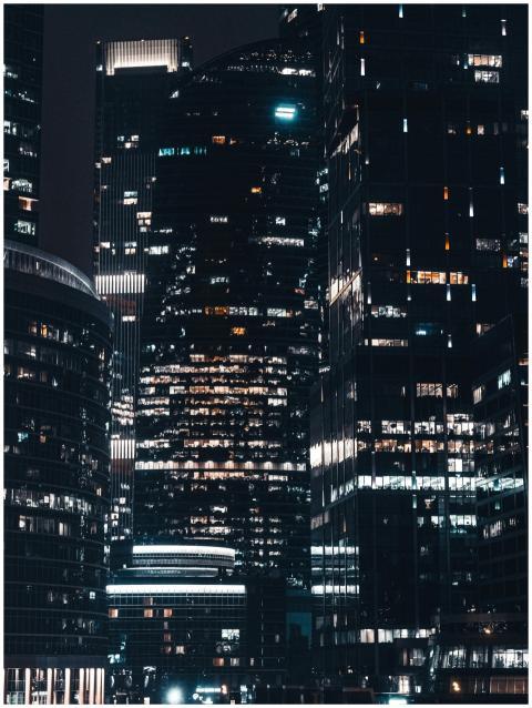 Night view of illuminated skyscrapers in Moscow Ci