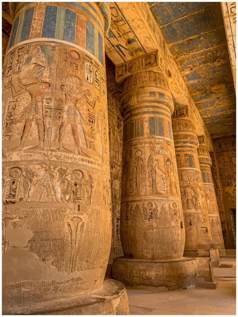 Intricately carved columns in the Luxor Temple, sh