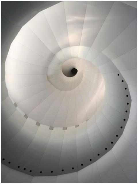 Top view of modern light gray twisting constructio