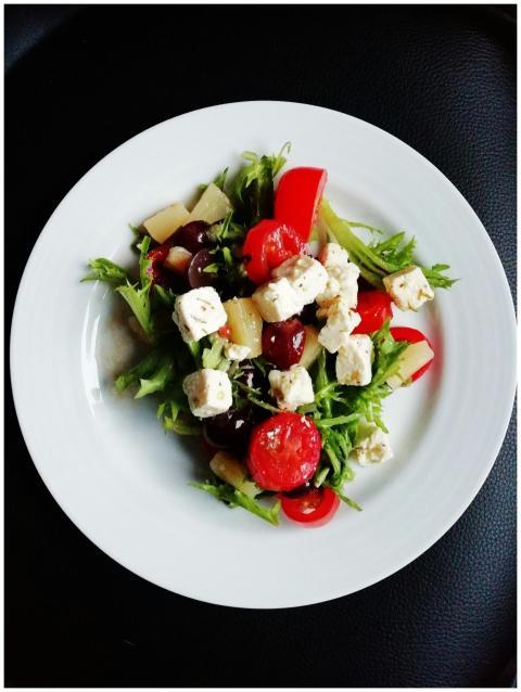Delicious Greek salad featuring fresh vegetables a