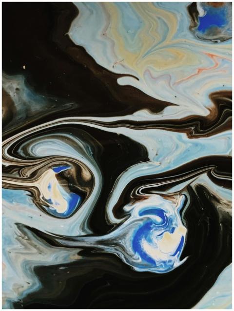 Dynamic abstract artwork showcasing swirling blue