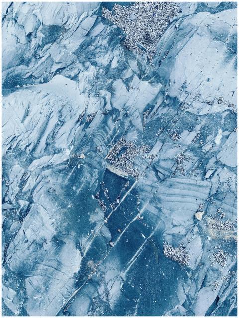 Close-up of a textured blue rock formation showcas