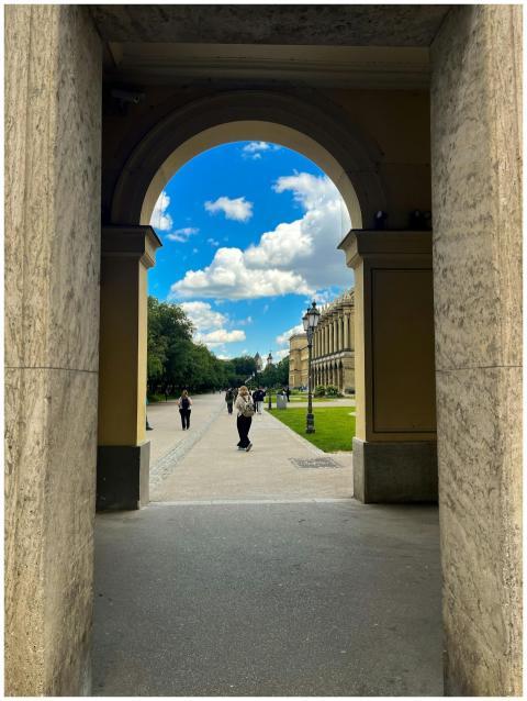 Scenic view through an archway, capturing Munich's