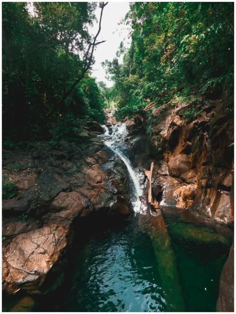 Discover a tranquil waterfall in Romblon's lush la