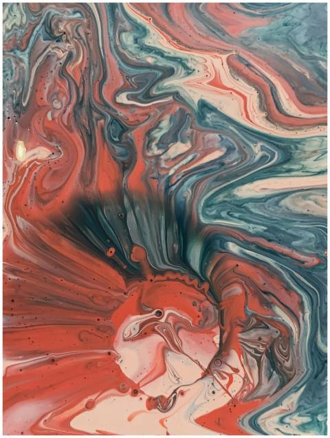 Colorful swirls of acrylic paint creating a vivid