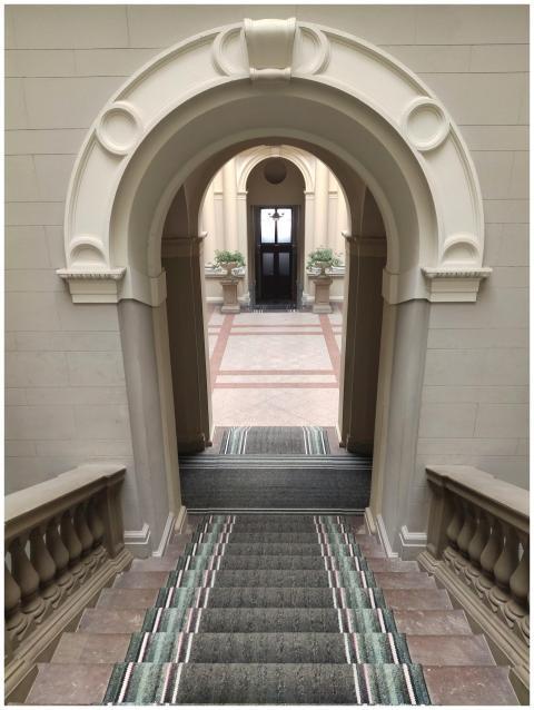 A detailed view of an elegant stairway leading thr