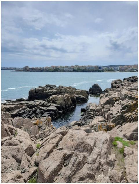 Scenic Rocky Coastline Distant