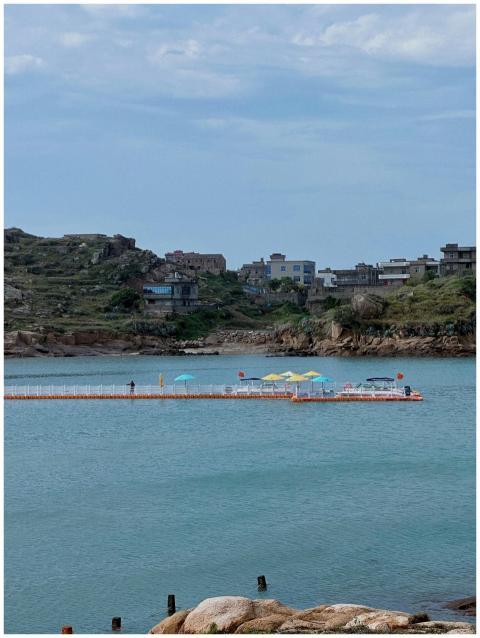 Peaceful coastal scene with a floating platform an