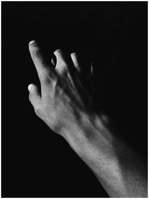 Black and white artistic photograph of a human han