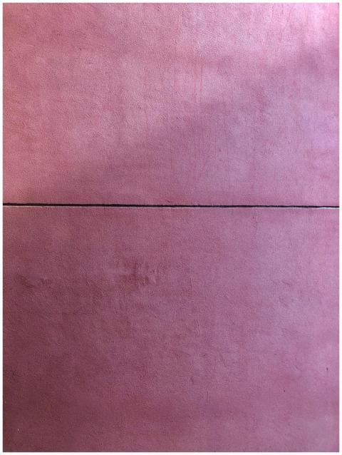 A seamless pink concrete wall texture, perfect for