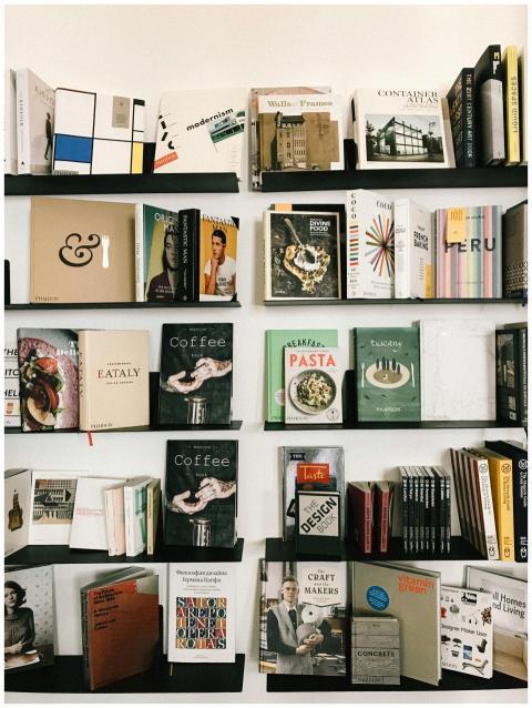 A beautifully curated bookshelf displaying a diver
