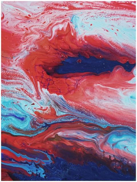 Explosive abstract artwork with swirling red and b