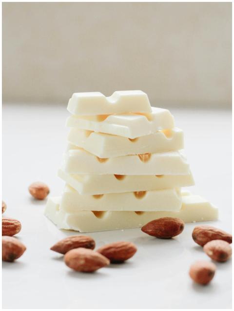 Delicious white chocolate stacked with almonds for