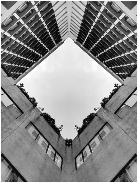 Stunning low-angle view of contemporary skyscraper