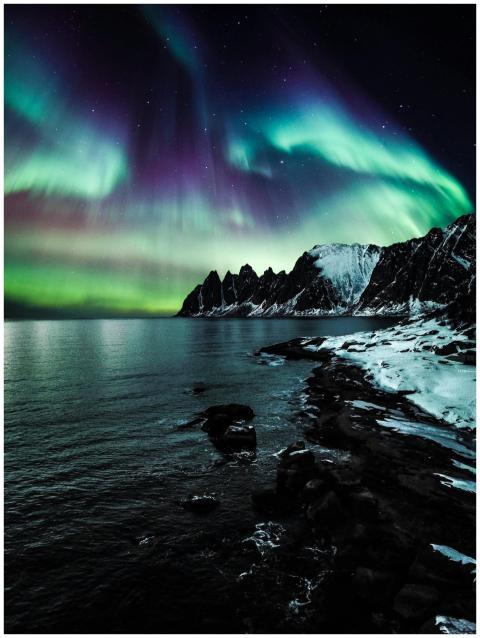 Majestic northern lights illuminate the snow-cover