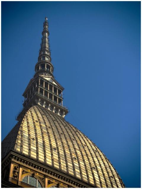 Iconic Mole Antonelliana of Turin silhouetted agai