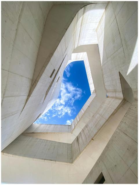 Modern architectural structure with a blue sky vie