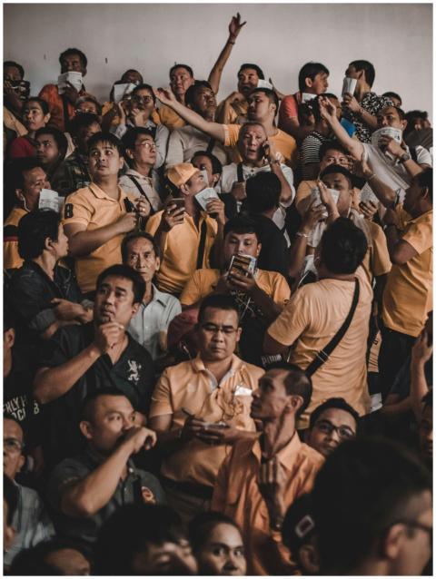 A lively crowd gathered in Bangkok, Thailand, focu