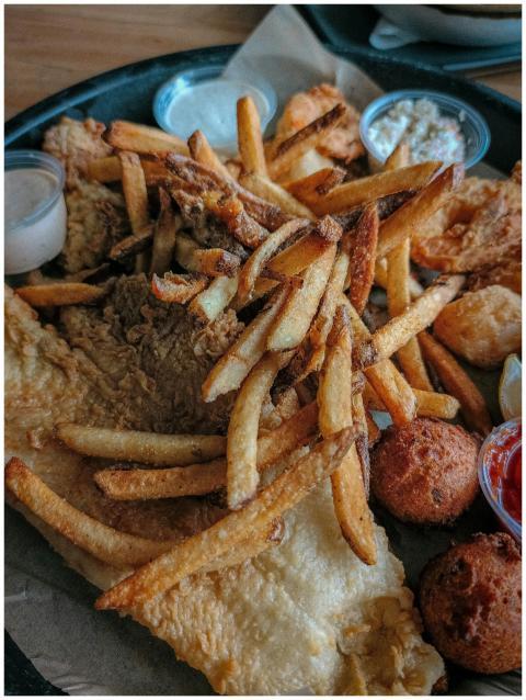 A mouth-watering platter of southern fried fish wi