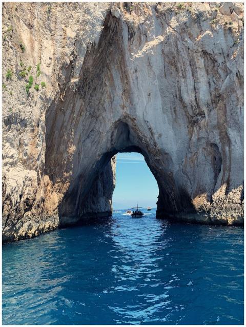 Stunning rock archway over blue waters at Capri, I