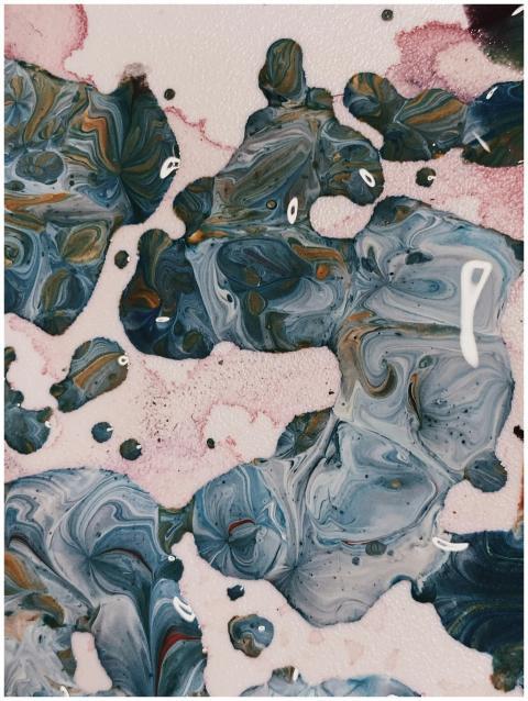 Vibrant abstract painting featuring swirling blue