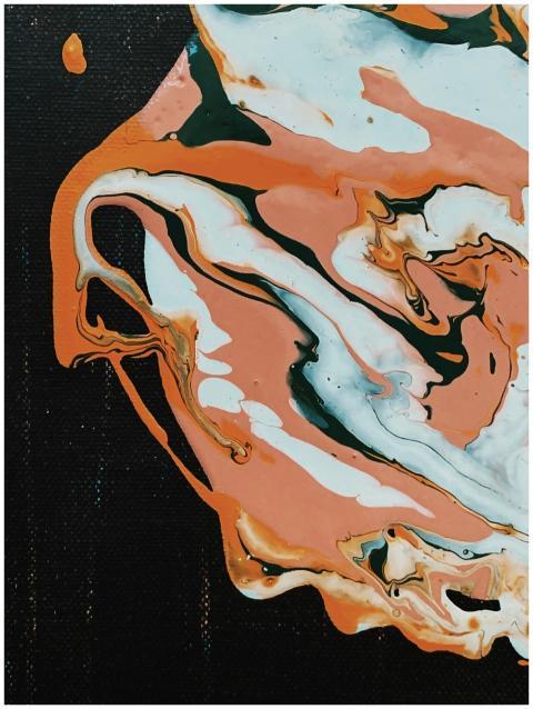 Vibrant abstract acrylic paint swirling in dynamic