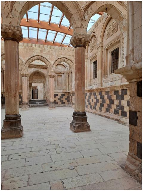 Interior view of ancient stone arches and columns