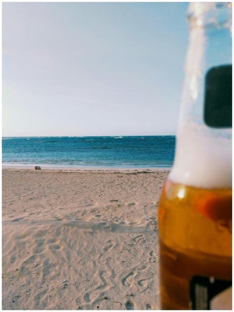 Cold beer on a sunny beach in Puerto Plata, Domini