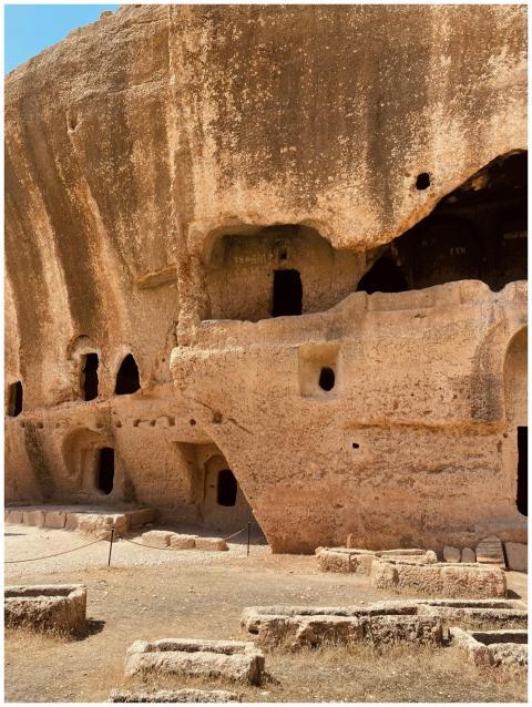 Explore the historic rock-hewn caves and facades i