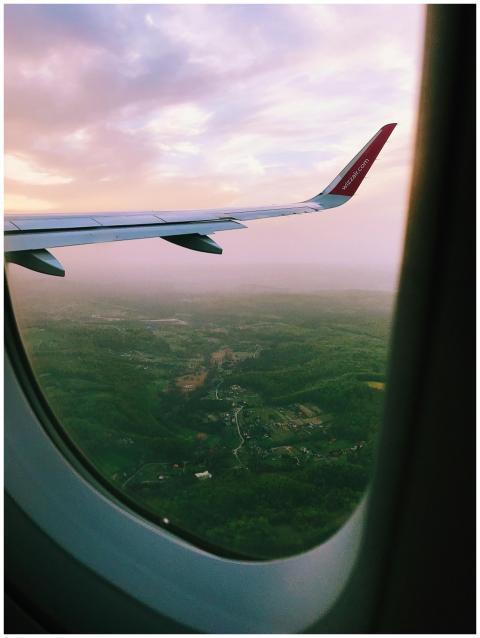 Peaceful aerial view of landscape through airplane