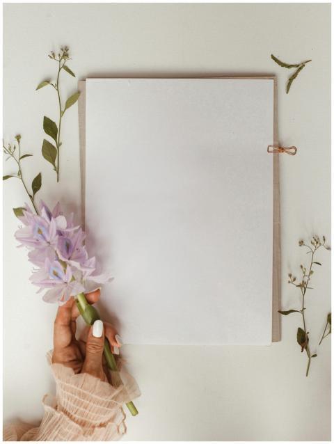 Styled mockup featuring a blank paper, delicate fl