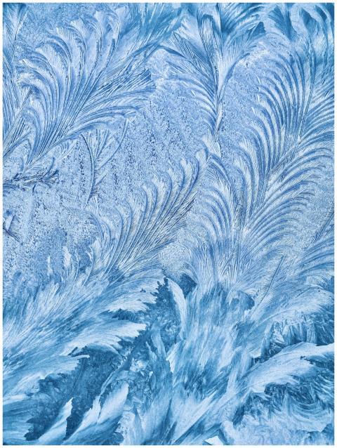 Detailed close-up of natural ice formations creati