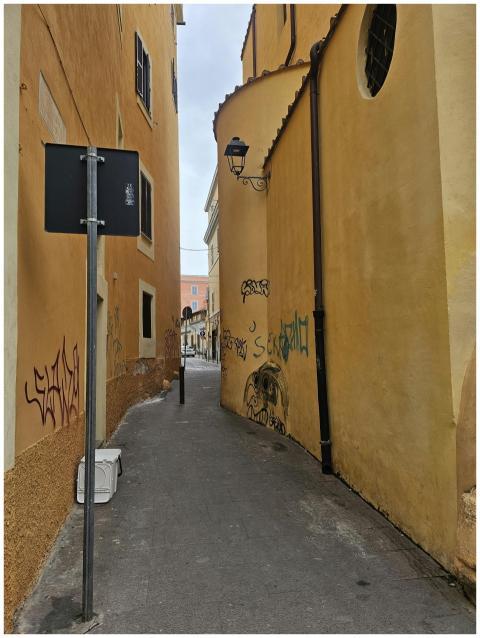 Narrow European Alleyway Graffiti