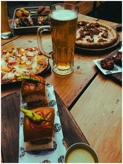 Enjoy a casual dining experience with pizza, slide