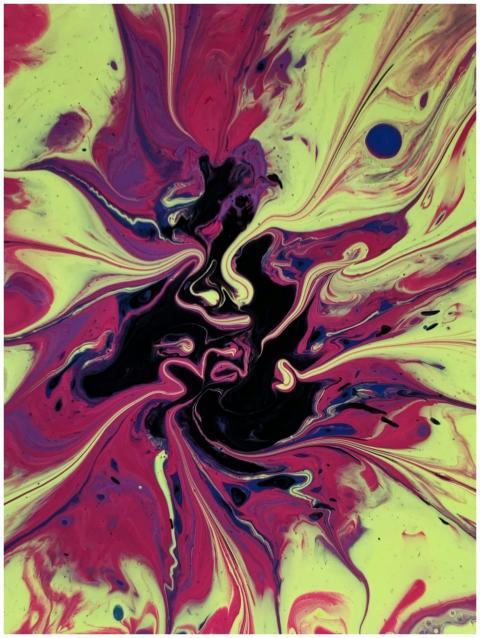Vivid abstract fluid art with swirling colors crea