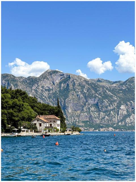 Stunning summer view of Perast, Montenegro with ru