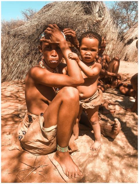 A close-up of an indigenous family in Namibia, cap
