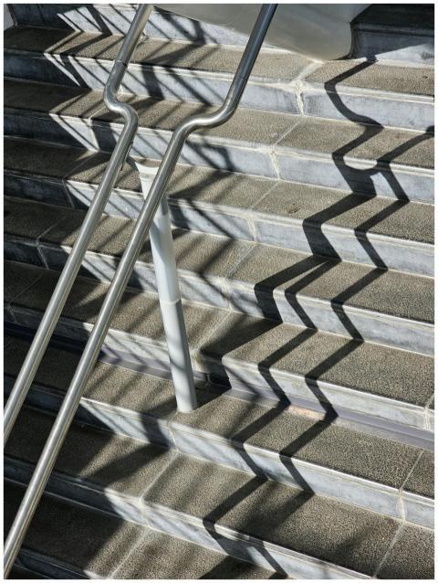 Modern staircase with intriguing shadow patterns i