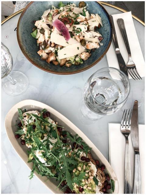 Overhead view of fresh gourmet salad dishes on ele