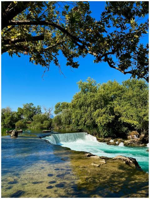 Beautiful view of Manavgat Waterfall with lush gre