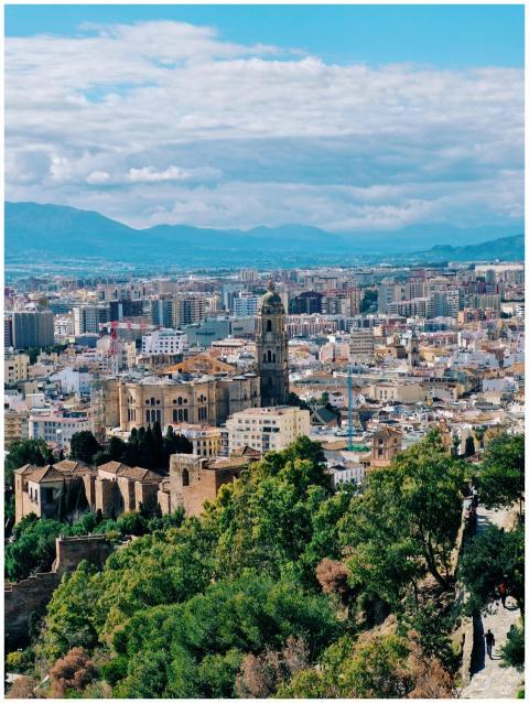 Explore the vibrant cityscape of Málaga with histo