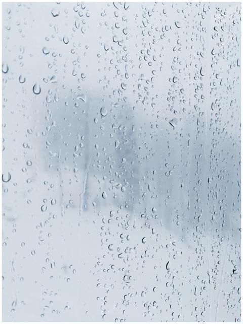 Close-up image of water droplets on a window creat