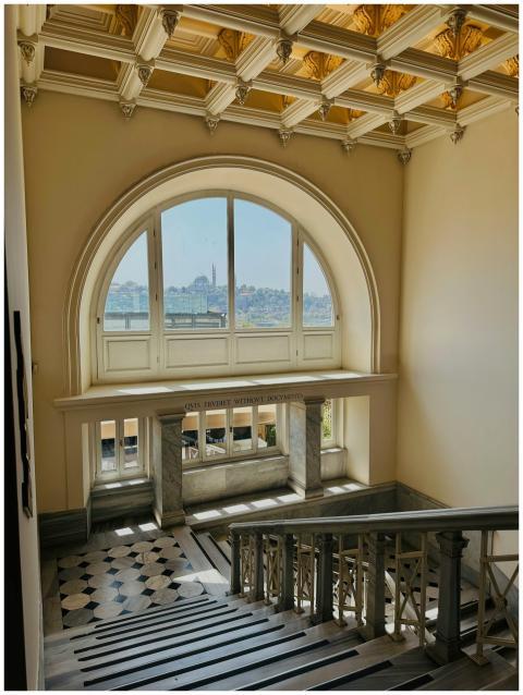 A beautiful staircase and window with a view of Ga