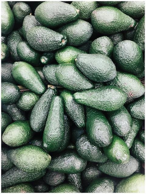 A pile of fresh Hass avocados, perfect for healthy