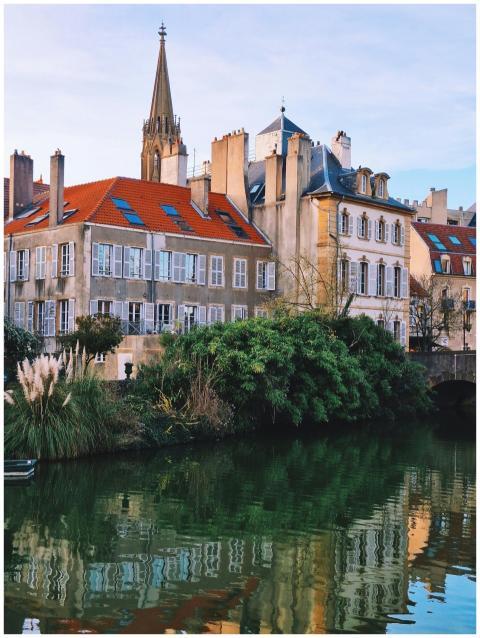 Charming riverside view with historic architecture