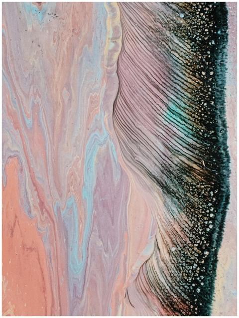 Vibrant abstract marbled painting with pink and bl