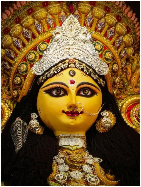 Close-up of a traditional Durga idol with intricat